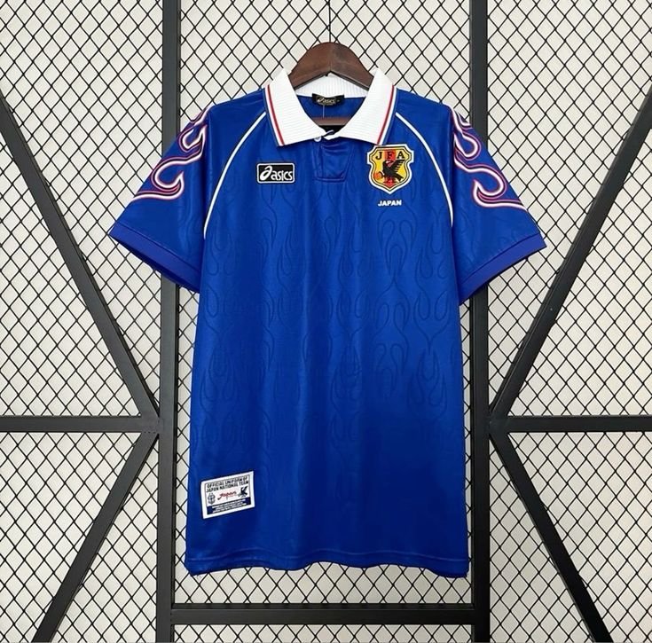 Blue Japan soccer jersey shown clearly on a hanger