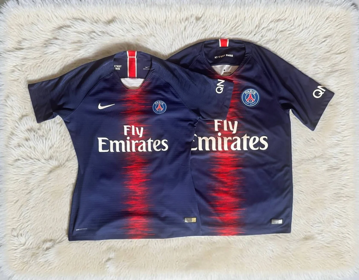 Two football jerseys showing player cut and fan cut differences