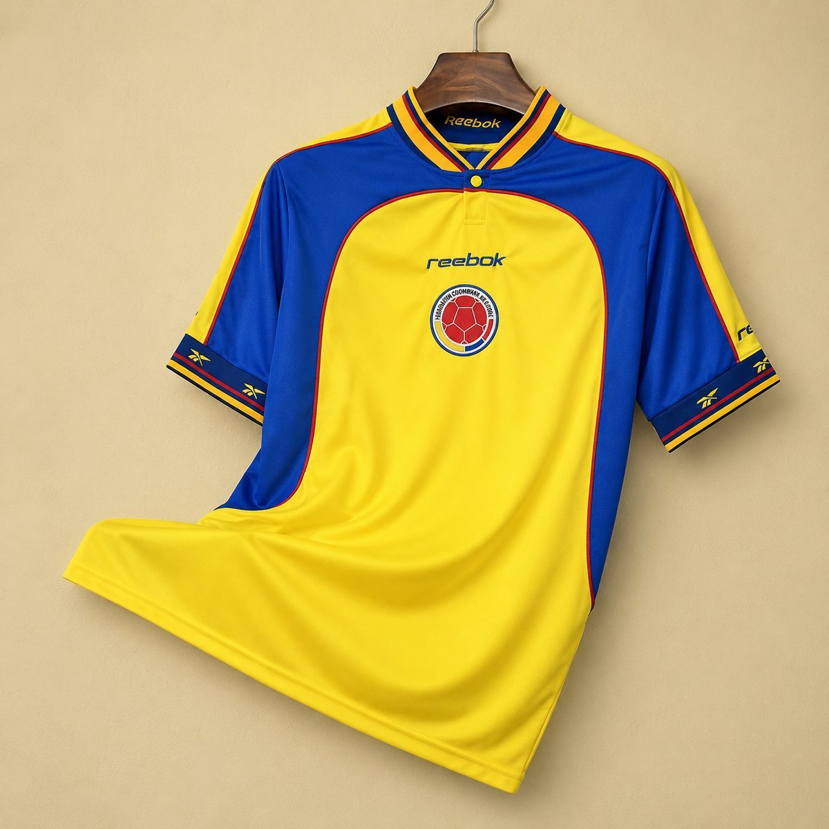 Reebok-era Colombia retro yellow polo with the Colombian Football Federation badge